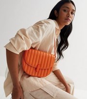New Look Bright Orange Leather-Look Quilted Saddle Cross Body Bag